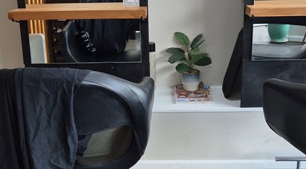 Modern salon chair and decor at Lela's Hair Lounge, Weston-super-mare, England, GB for a stylish experience.