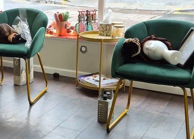 Elegant seating area at Lela's Hair Lounge, Weston-super-mare, England, GB, showcasing stylish decor.