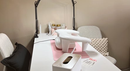 Manicure station at CSM Studios, Padbury, Western Australia, AU, with tools on a white table.