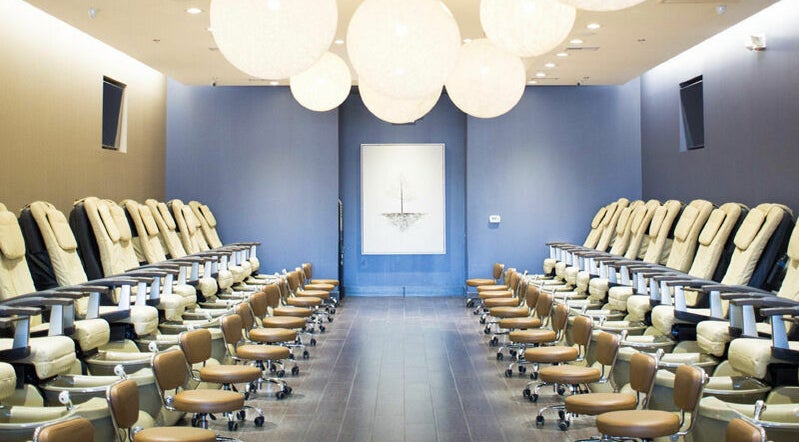 Luxurious pedicure chairs at Nail Lounge, Allen, Texas, US, offering a tranquil spa experience.