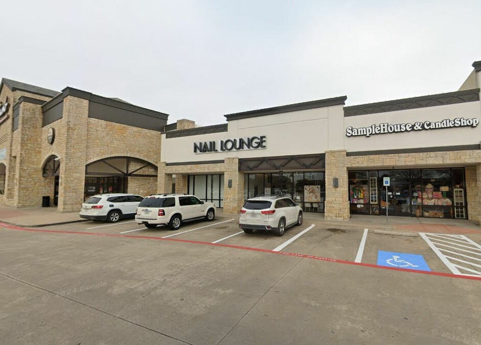 Front exterior of Nail Lounge in Allen, Texas, US, showcasing spacious parking and inviting entrance.