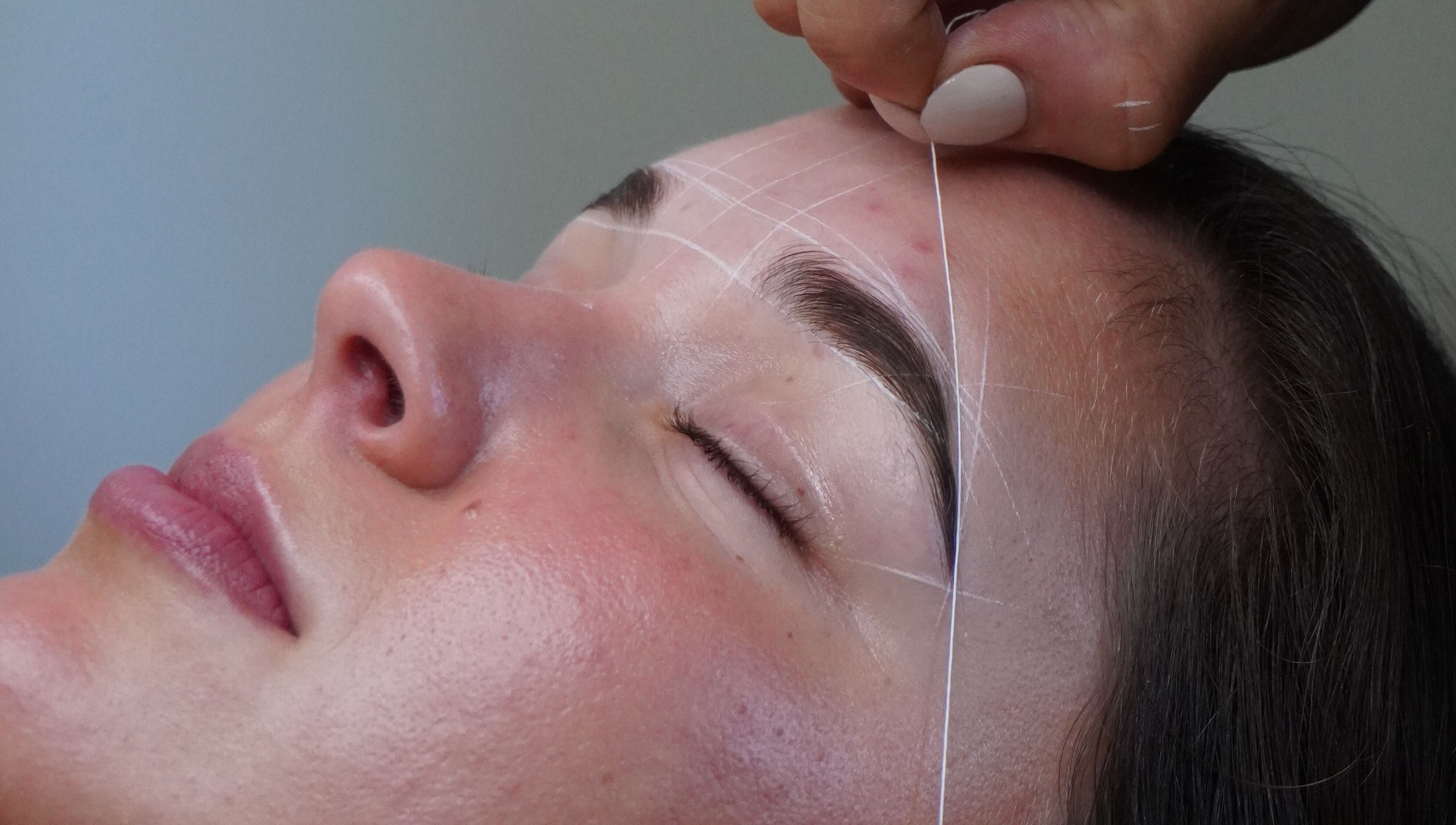Expert brow threading at Browed by Sian, Melbourne, Victoria, AU, enhancing client beauty with precision.