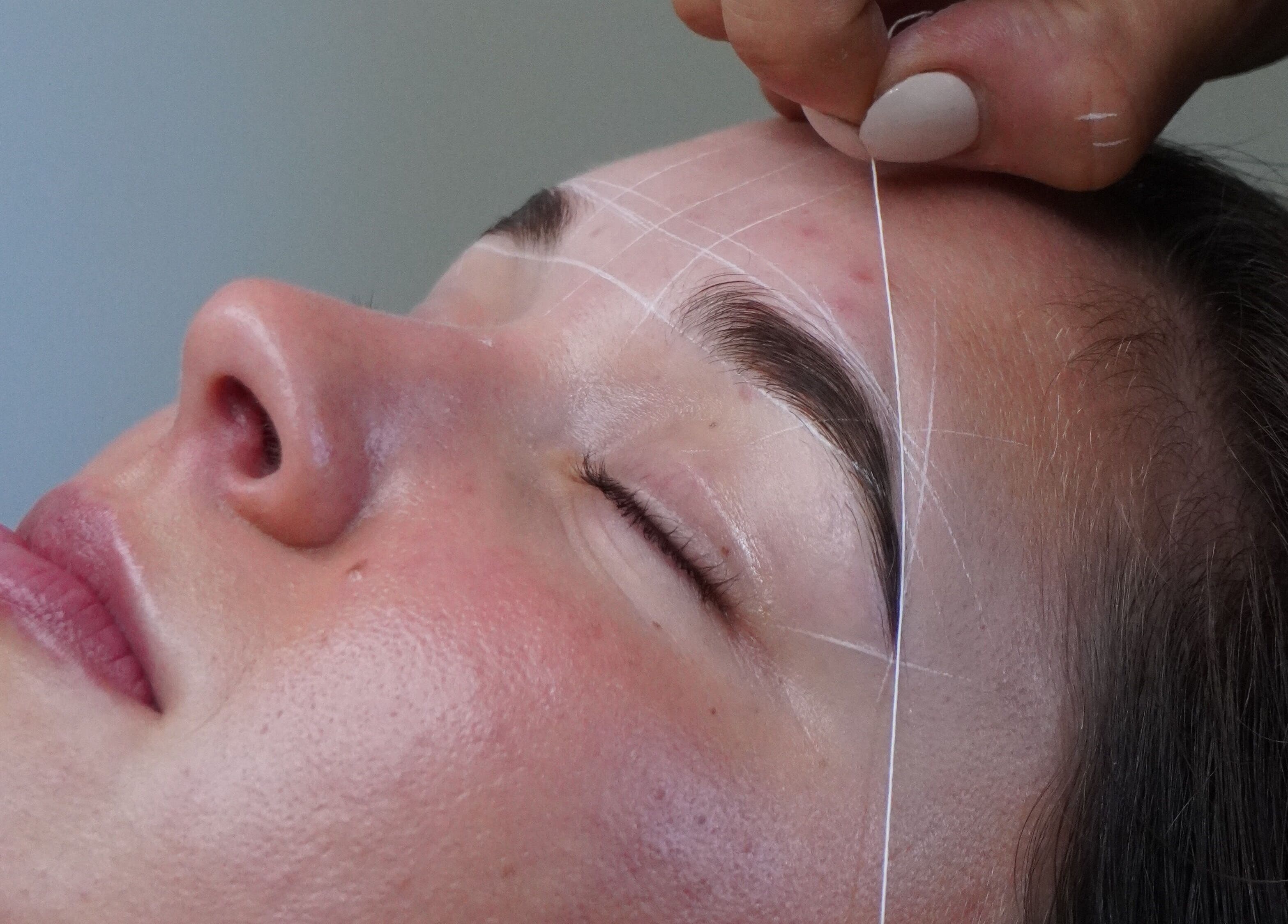 Expert brow threading at Browed by Sian, Melbourne, Victoria, AU, enhancing client beauty with precision.