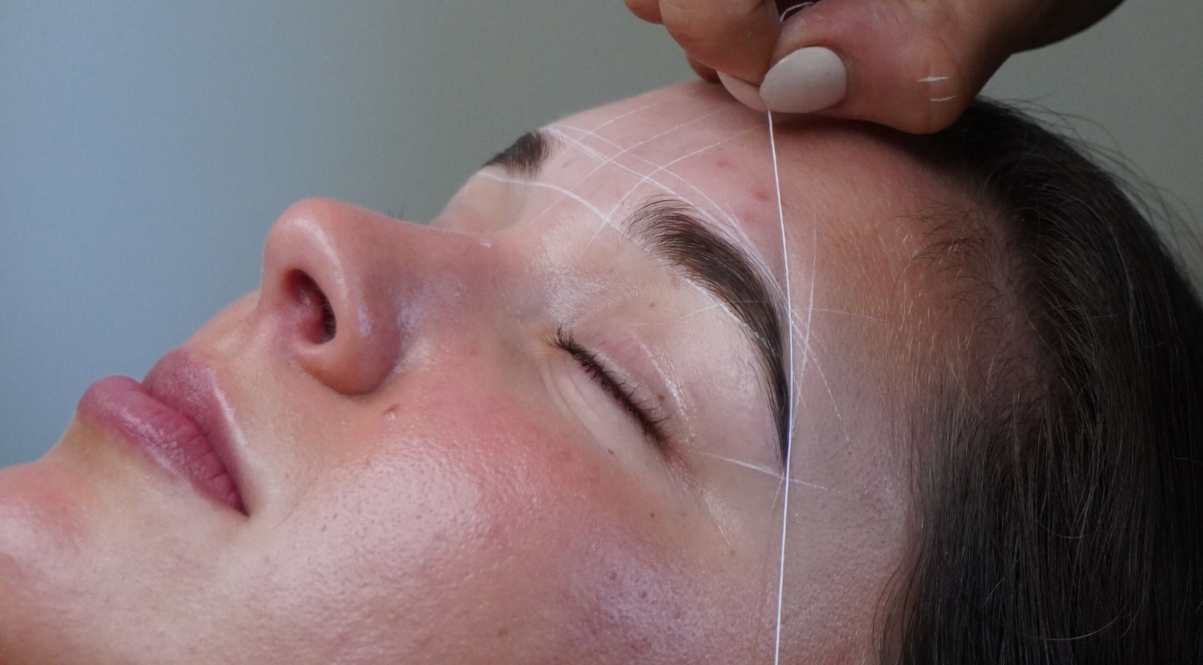Expert brow threading at Browed by Sian, Melbourne, Victoria, AU, enhancing client beauty with precision.