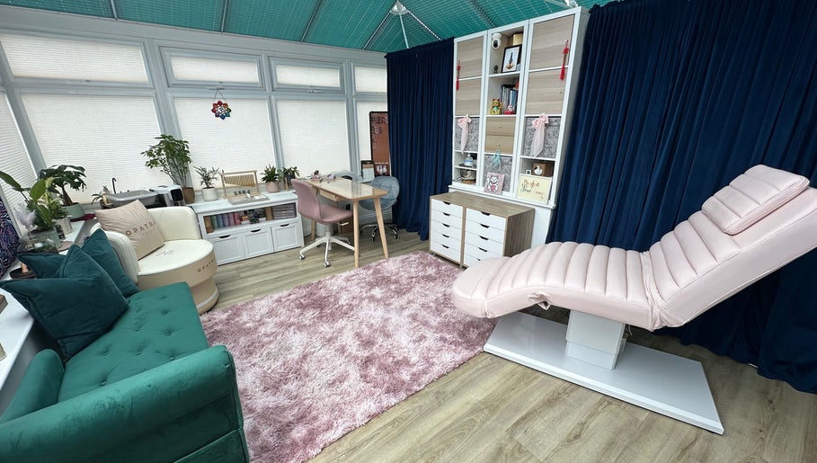 Calming beauty room at Inner Divine Beauty - Home Studio, Manchester, England, GB with plush seating and decor.