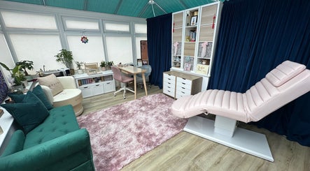 Calming beauty room at Inner Divine Beauty - Home Studio, Manchester, England, GB with plush seating and decor.
