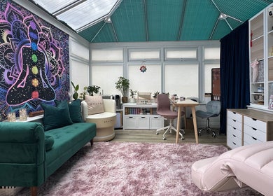 Inner Divine Beauty - Home Studio in Manchester, England, GB, features a vibrant chakra mural and plush seating.