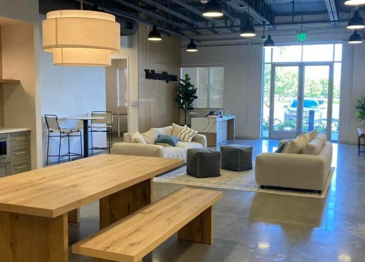 Modern lounge at Dyamond Sculpted in Rancho Cucamonga, California, US, with cozy seating and natural light.