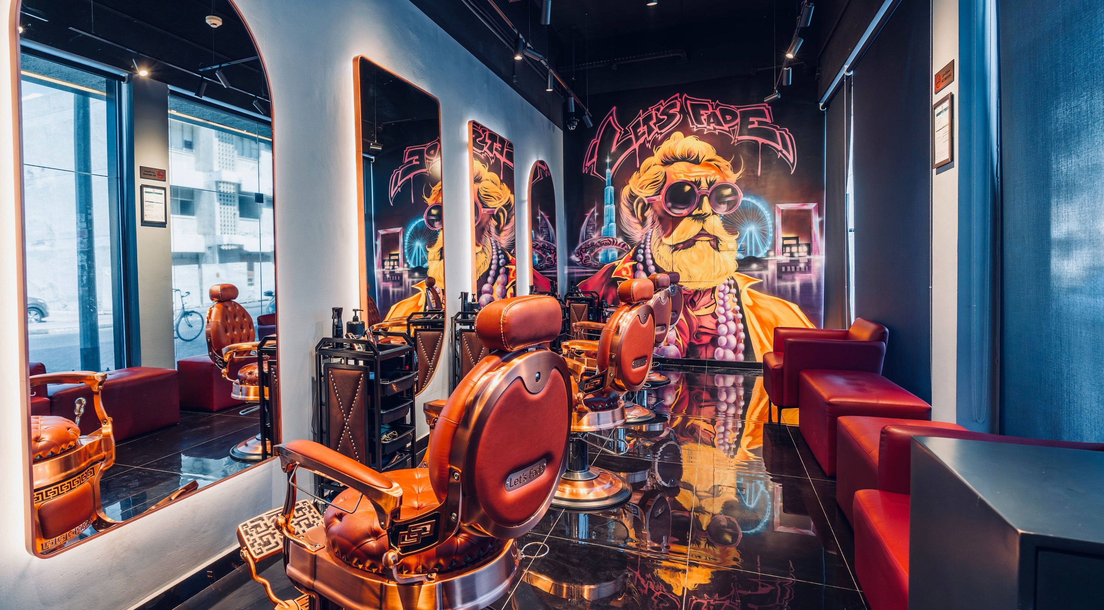 Modern barber shop at Let's Fade Bespoke in Dubai, Dubai, AE, featuring stylish chairs and vibrant art.