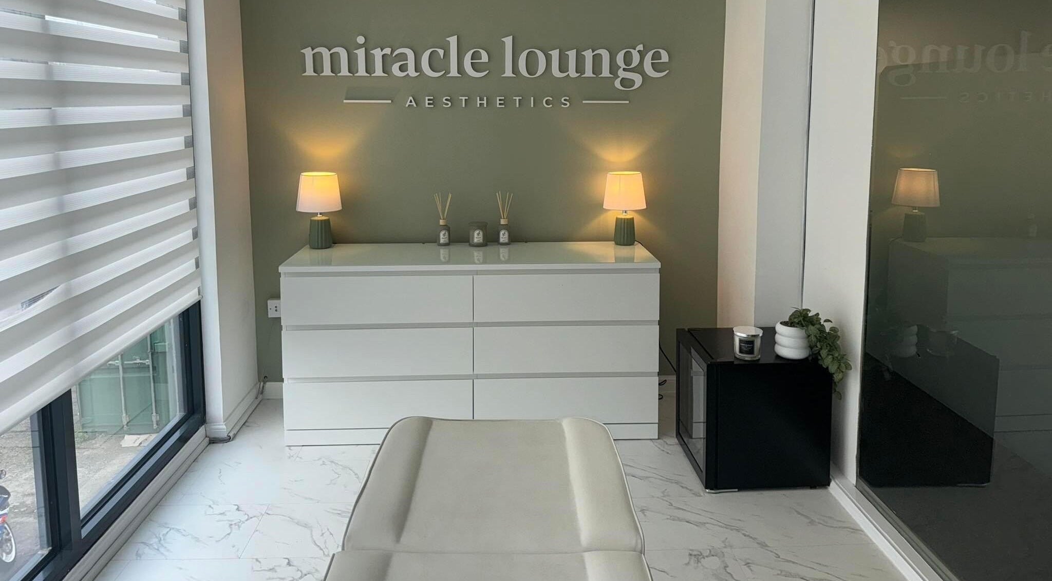 Elegant Miracle Lounge interior in Glasgow, Scotland, GB featuring sleek decor and ambient lighting.