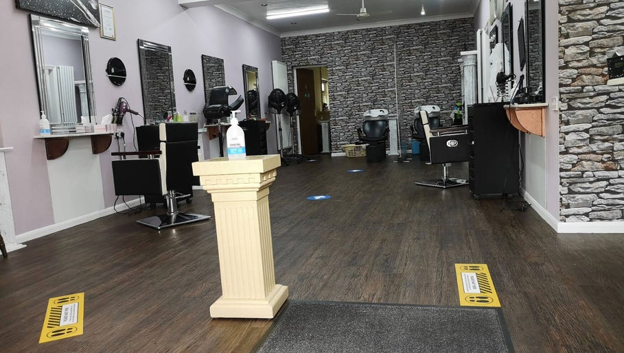Interior view of Medusa's Hair and Beauty Salon in Lowestoft, England, GB, featuring modern styling stations.
