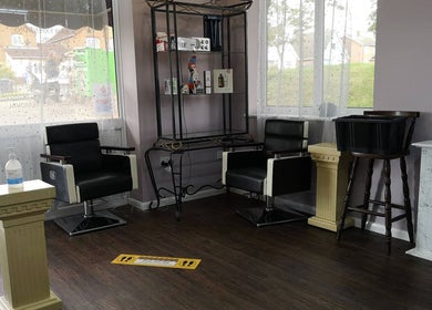 Chic interior of Medusa's Hair and Beauty Salon, Lowestoft, England, GB, featuring styling chairs and decor.