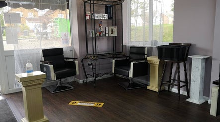 Chic interior of Medusa's Hair and Beauty Salon, Lowestoft, England, GB, featuring styling chairs and decor.