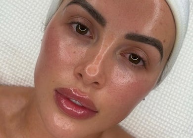Facial treatment at Shaped Co., Westhoughton, England, GB showcasing glowing skin.