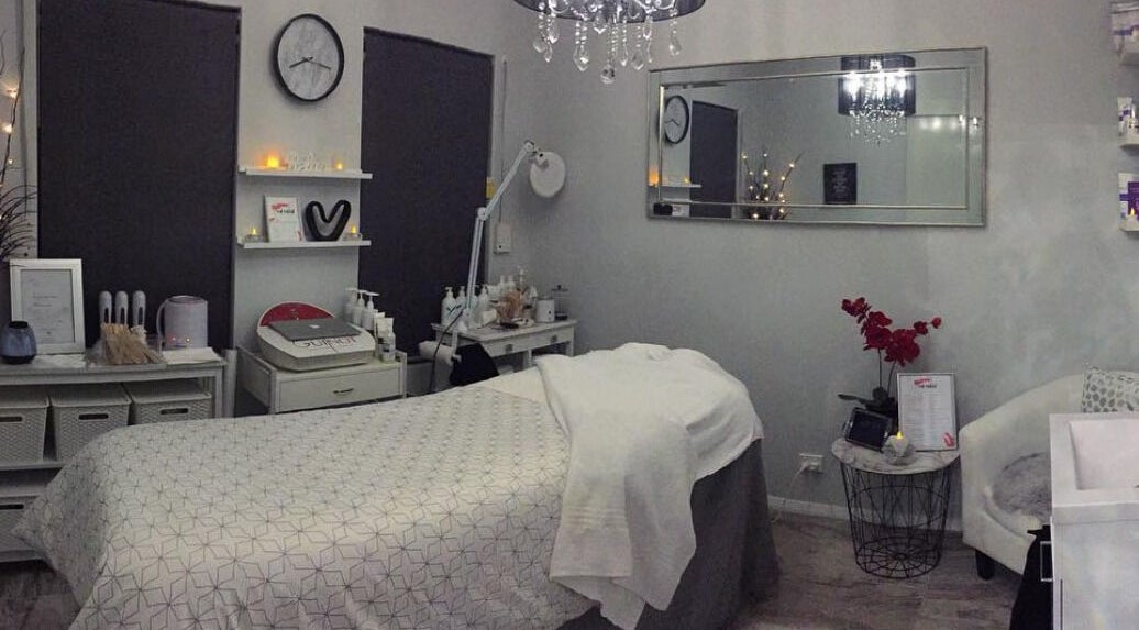 Tranquil treatment room at Red Orchid Massage and Beauty Therapy, Perth, WA, AU, featuring a massage bed.