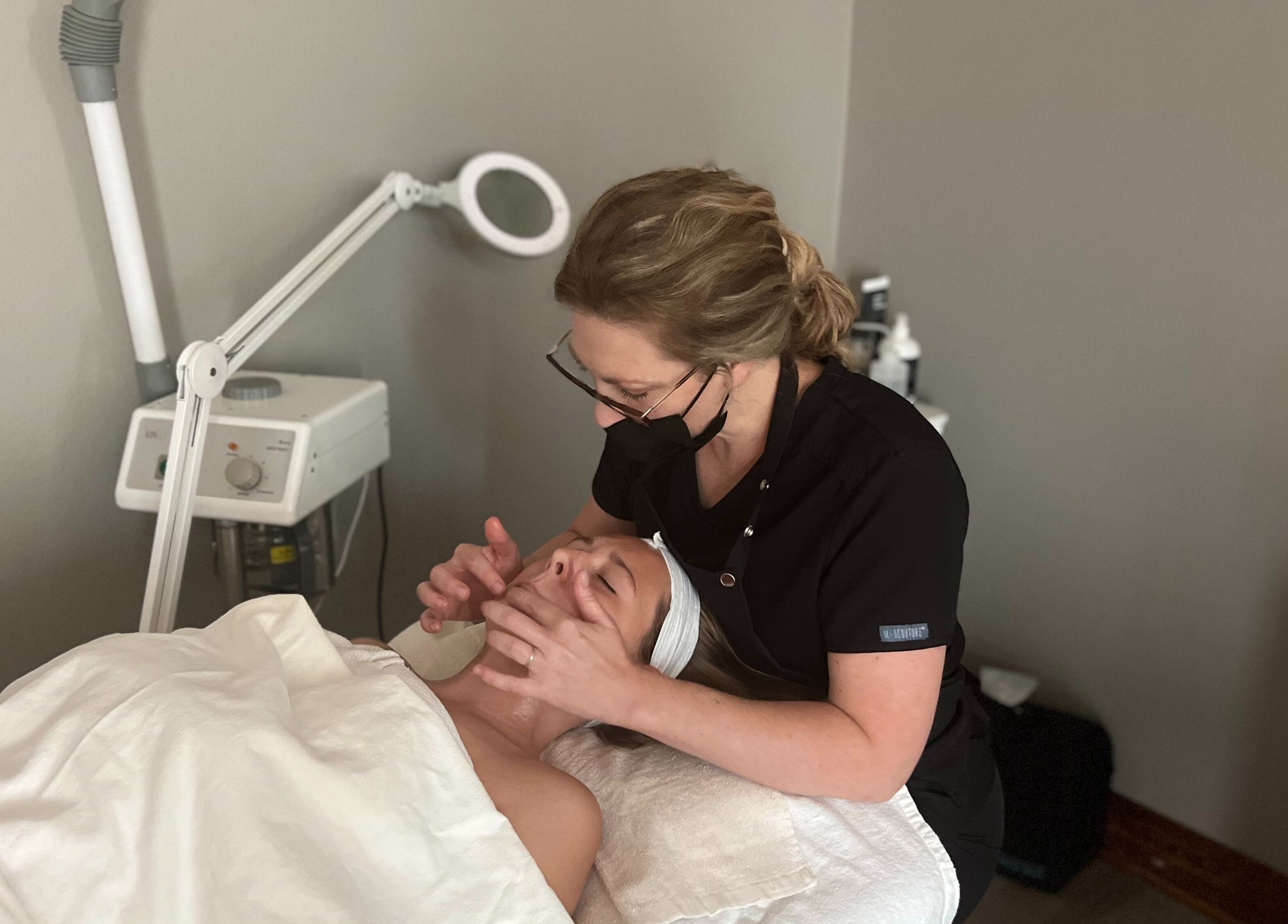 Facial treatment at Fuller Esthetics, Montgomery, Texas, US shows relaxing spa care.