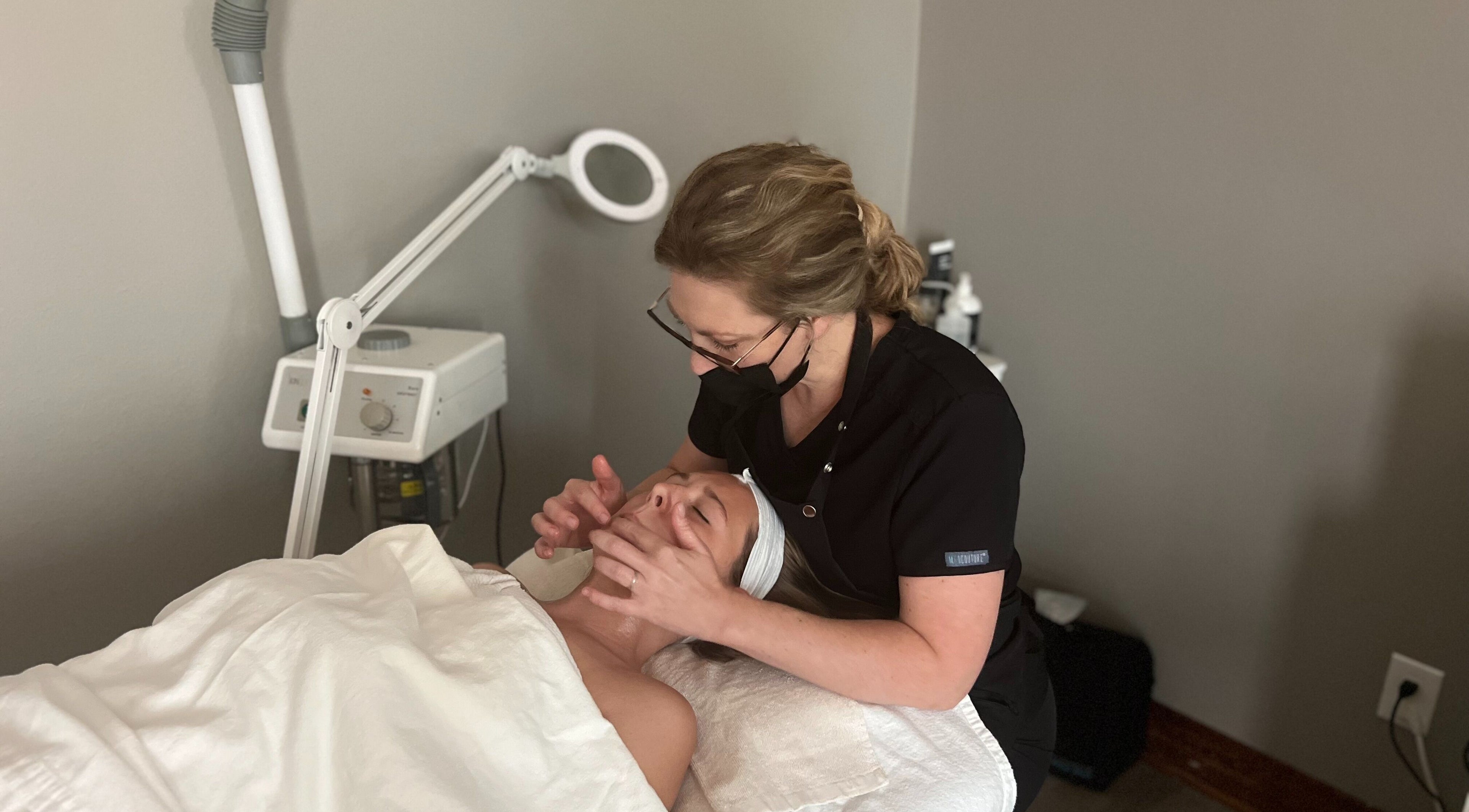 Facial treatment at Fuller Esthetics, Montgomery, Texas, US shows relaxing spa care.