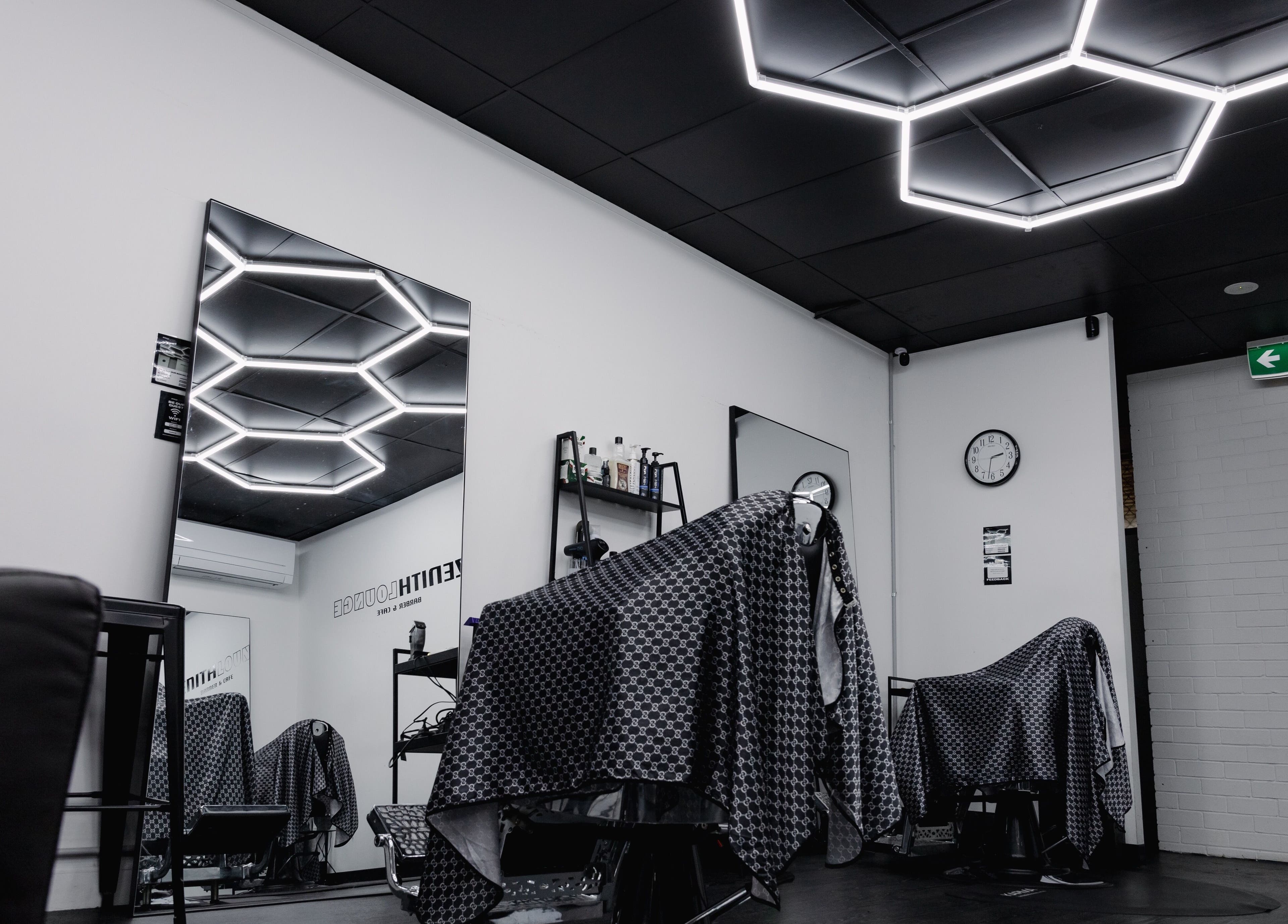 Modern barber setting at Zenith Lounge Barber & Cafe Tarragindi, Tarragindi, QLD, AU with sleek lighting.