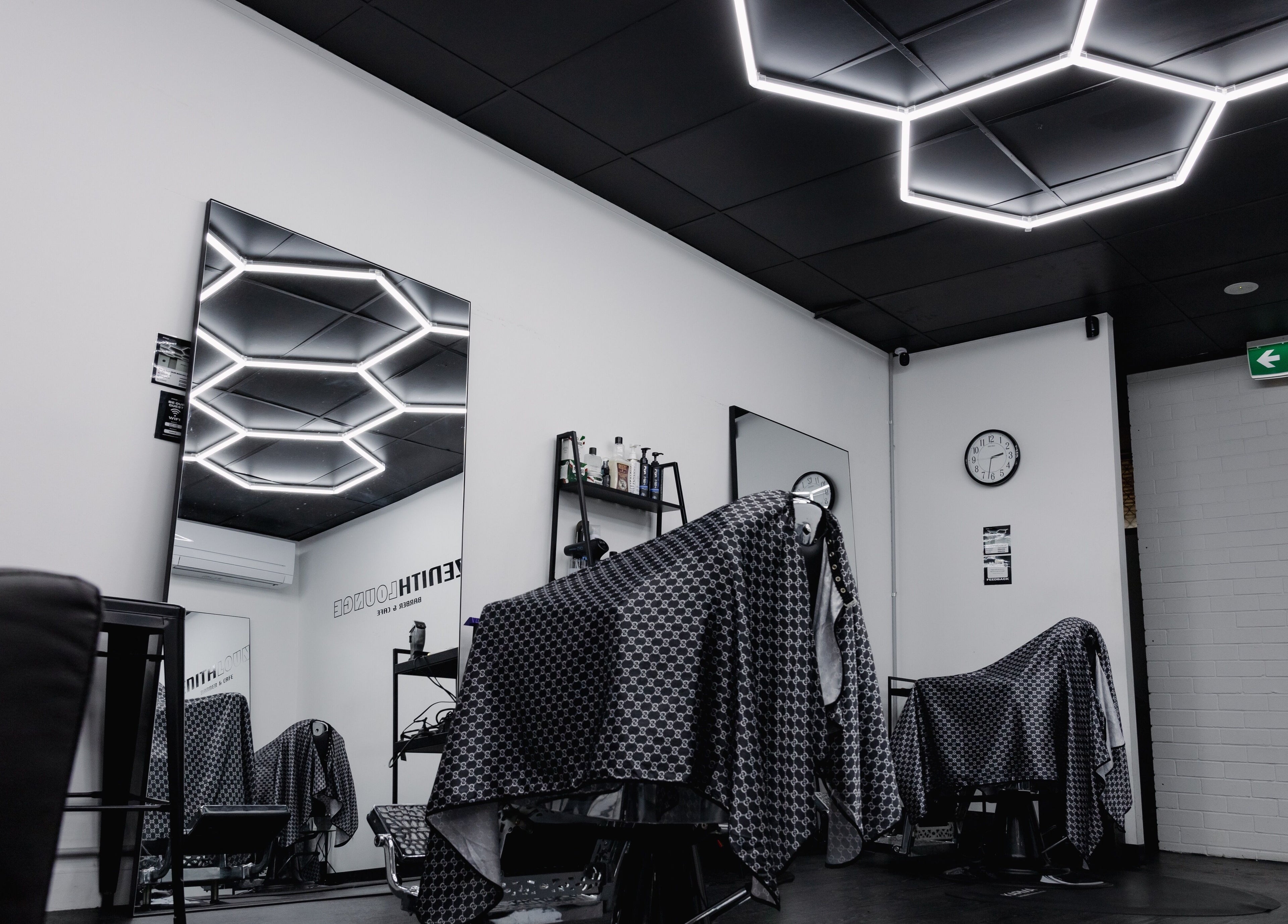 Modern barber setting at Zenith Lounge Barber & Cafe Tarragindi, Tarragindi, QLD, AU with sleek lighting.