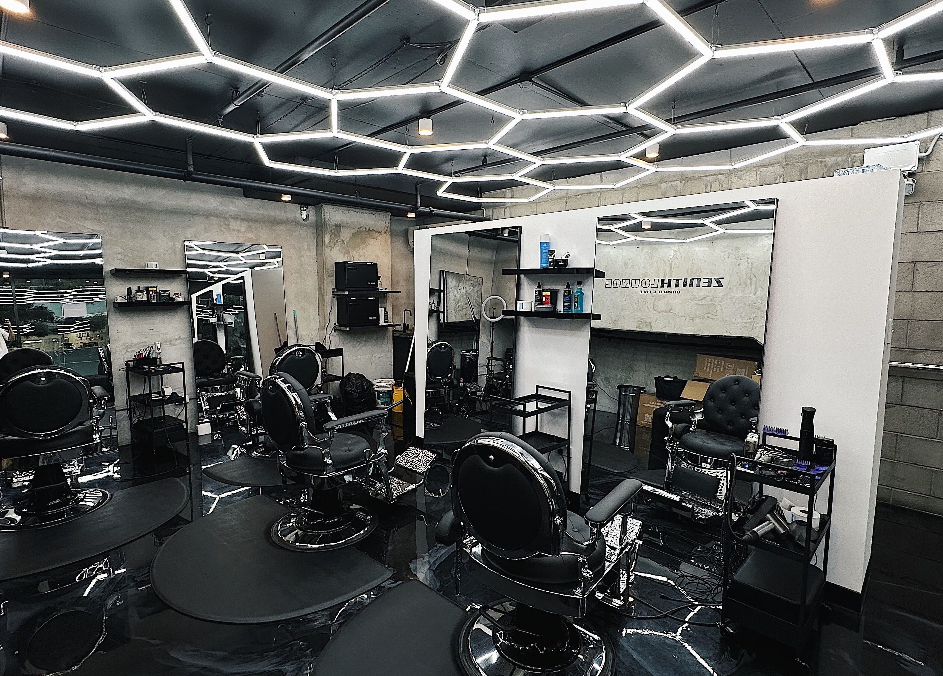Stylish interior of Zenith Lounge Barber & Cafe Kelvin Grove, Kelvin Grove, Queensland, AU with modern barber chairs.