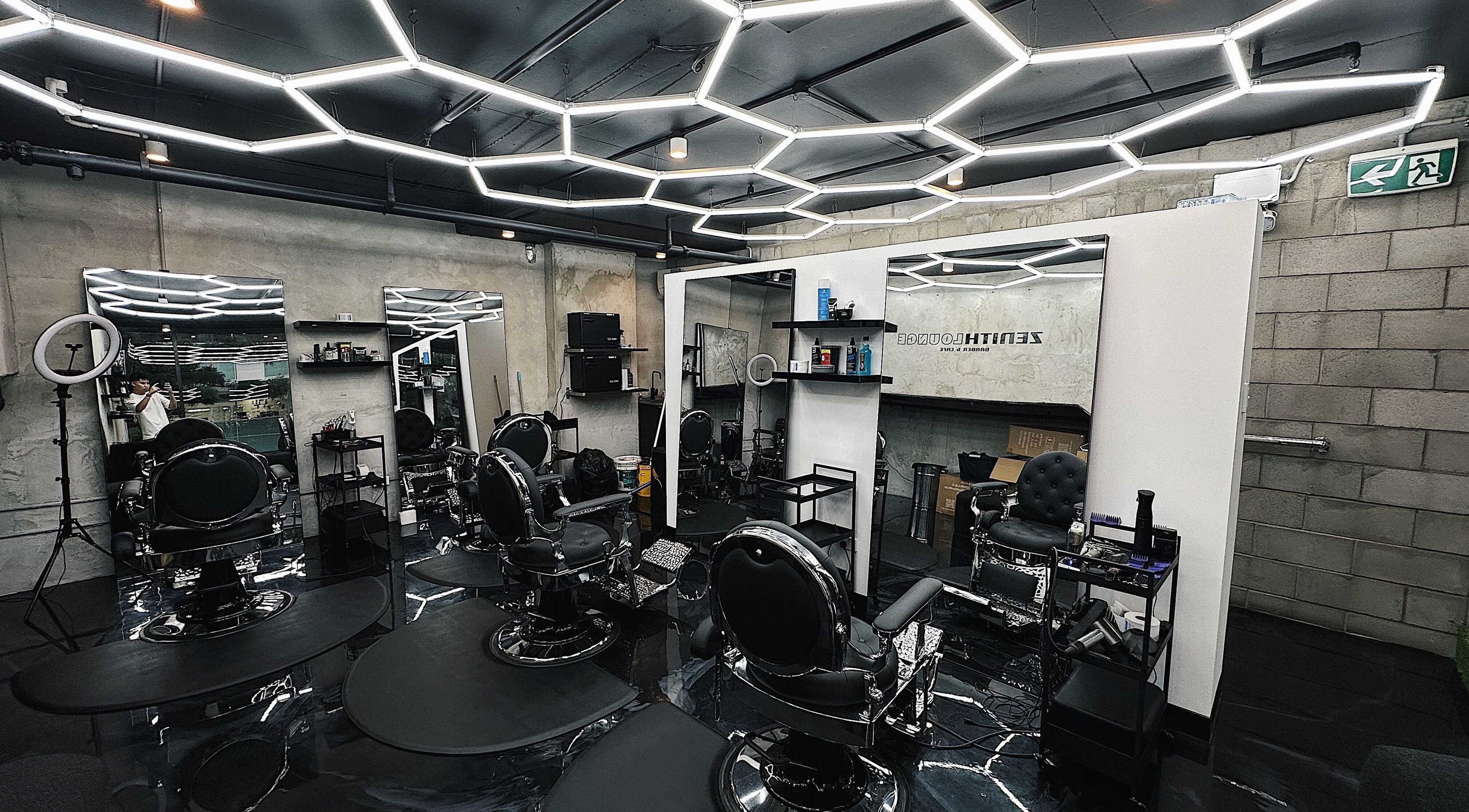 Stylish interior of Zenith Lounge Barber & Cafe Kelvin Grove, Kelvin Grove, Queensland, AU with modern barber chairs.