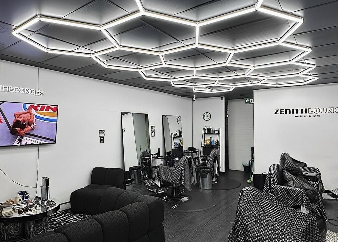 Interior of Zenith Lounge Barber & Cafe Kelvin Grove, showcasing sleek design and modern lighting. Kelvin Grove, Queensland, AU.