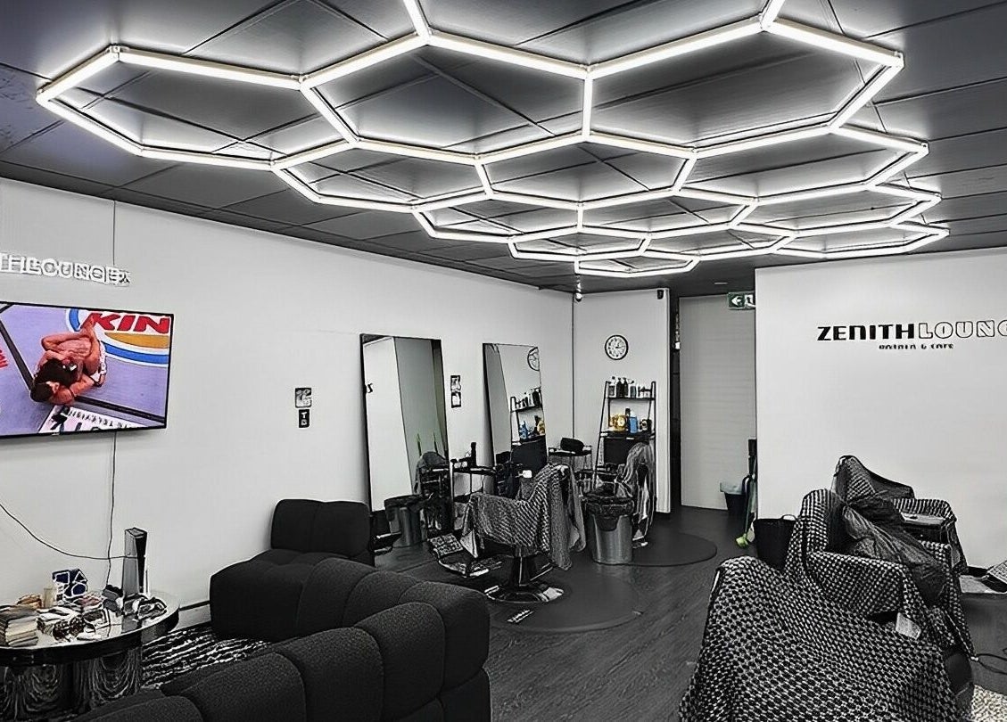 Interior of Zenith Lounge Barber & Cafe Kelvin Grove, showcasing sleek design and modern lighting. Kelvin Grove, Queensland, AU.