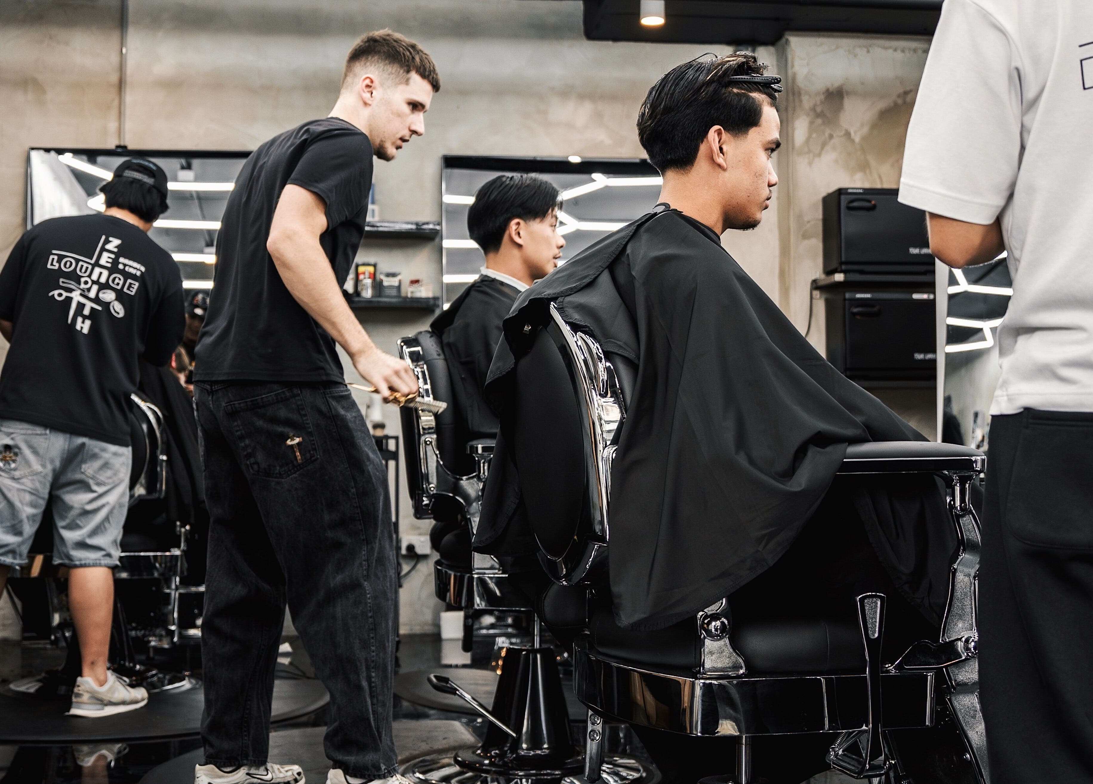 Stylish barbershop scene at Zenith Lounge Barber & Cafe Kelvin Grove, Queensland, AU.