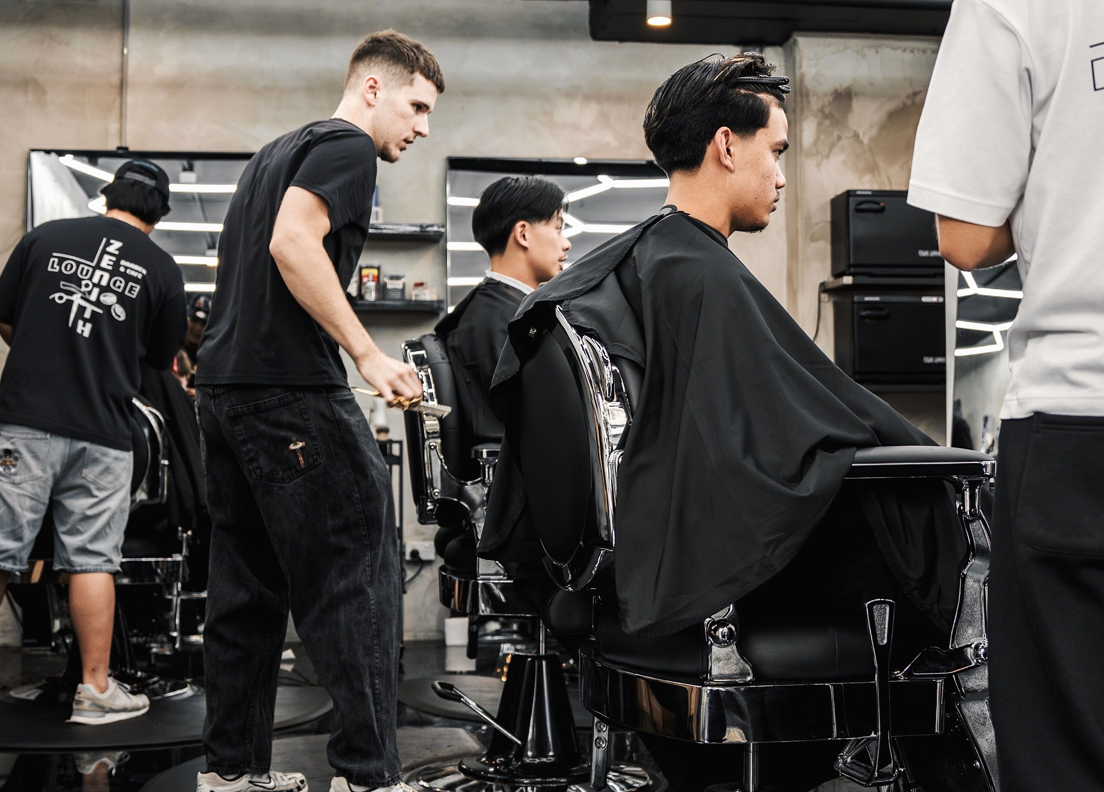 Stylish barbershop scene at Zenith Lounge Barber & Cafe Kelvin Grove, Queensland, AU.