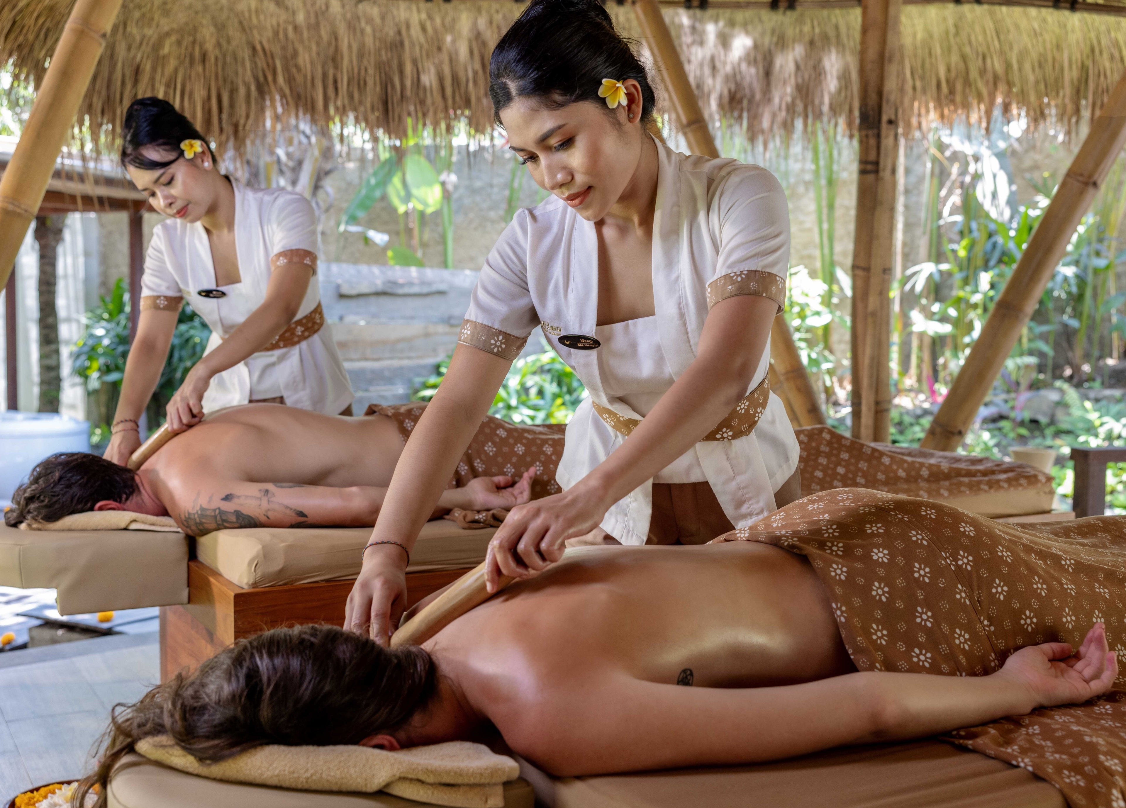 Therapist performing massage at Mahamaya Spa, Ubud Nyuh Bali Resort, Bali, Bali, ID, in a serene setting.