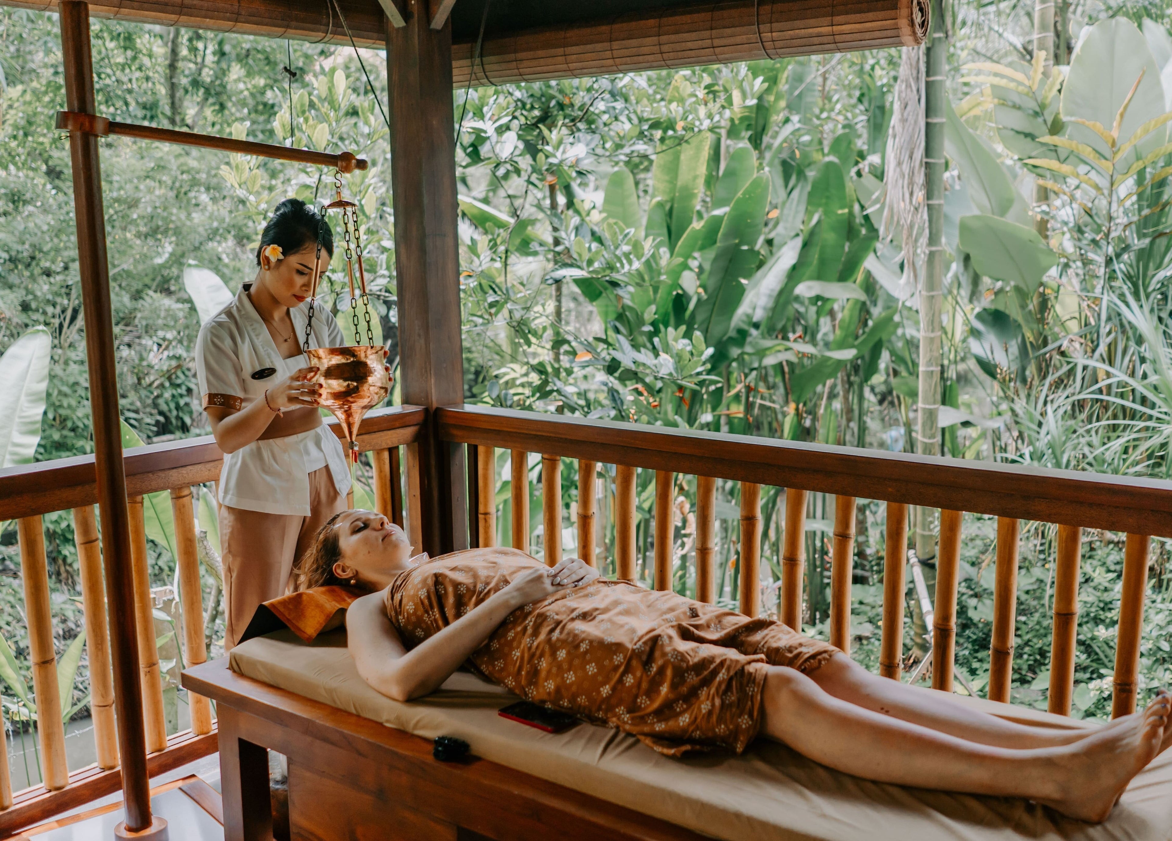 Relaxing spa treatment at Mahamaya Spa at Ubud Nyuh Bali Resort, surrounded by lush greenery in Bali, Bali, ID.