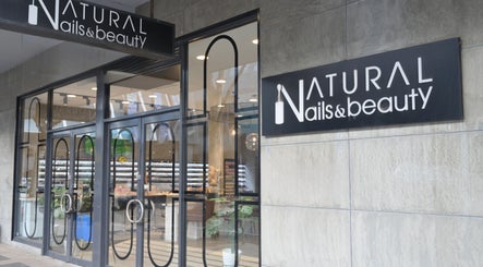Front view of Natural Nails and Beauty Frankston in Melbourne, Victoria, AU with modern glass door entrance.