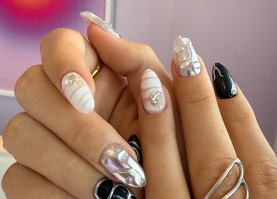 Stylish manicure featuring intricate designs at NAILSUNSHINE, Bali, Bali, ID.