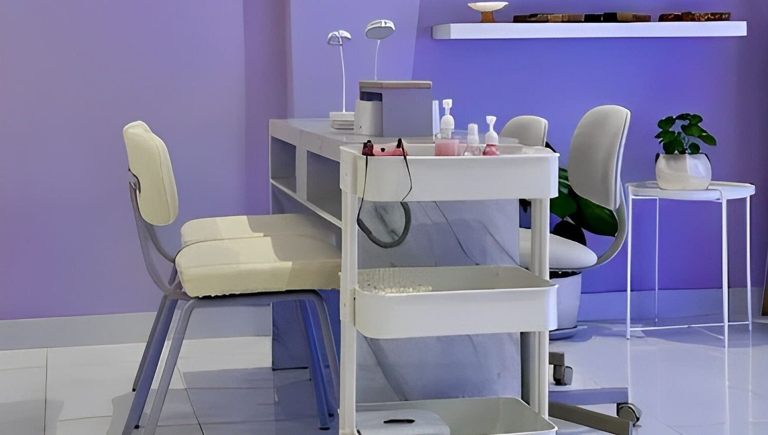 Modern nail salon at NAILSUNSHINE, Bali, Bali, ID featuring sleek workstations and calming purple walls.