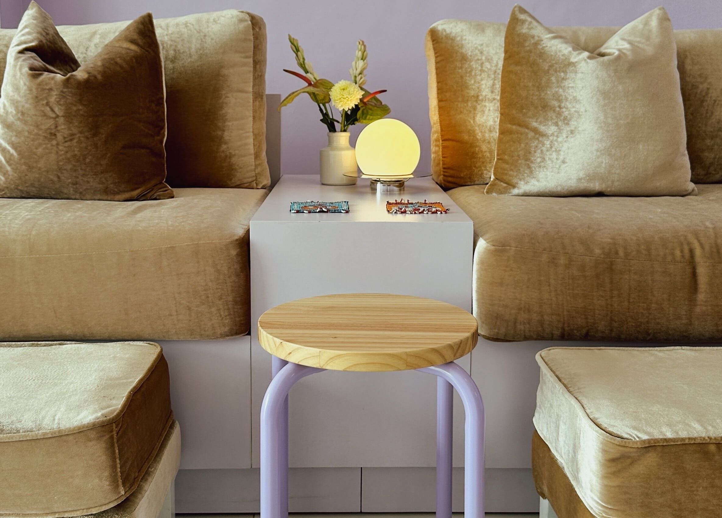 Luxurious seating area at NAILSUNSHINE, Bali, Bali, ID with plush cushions and ambient lighting.