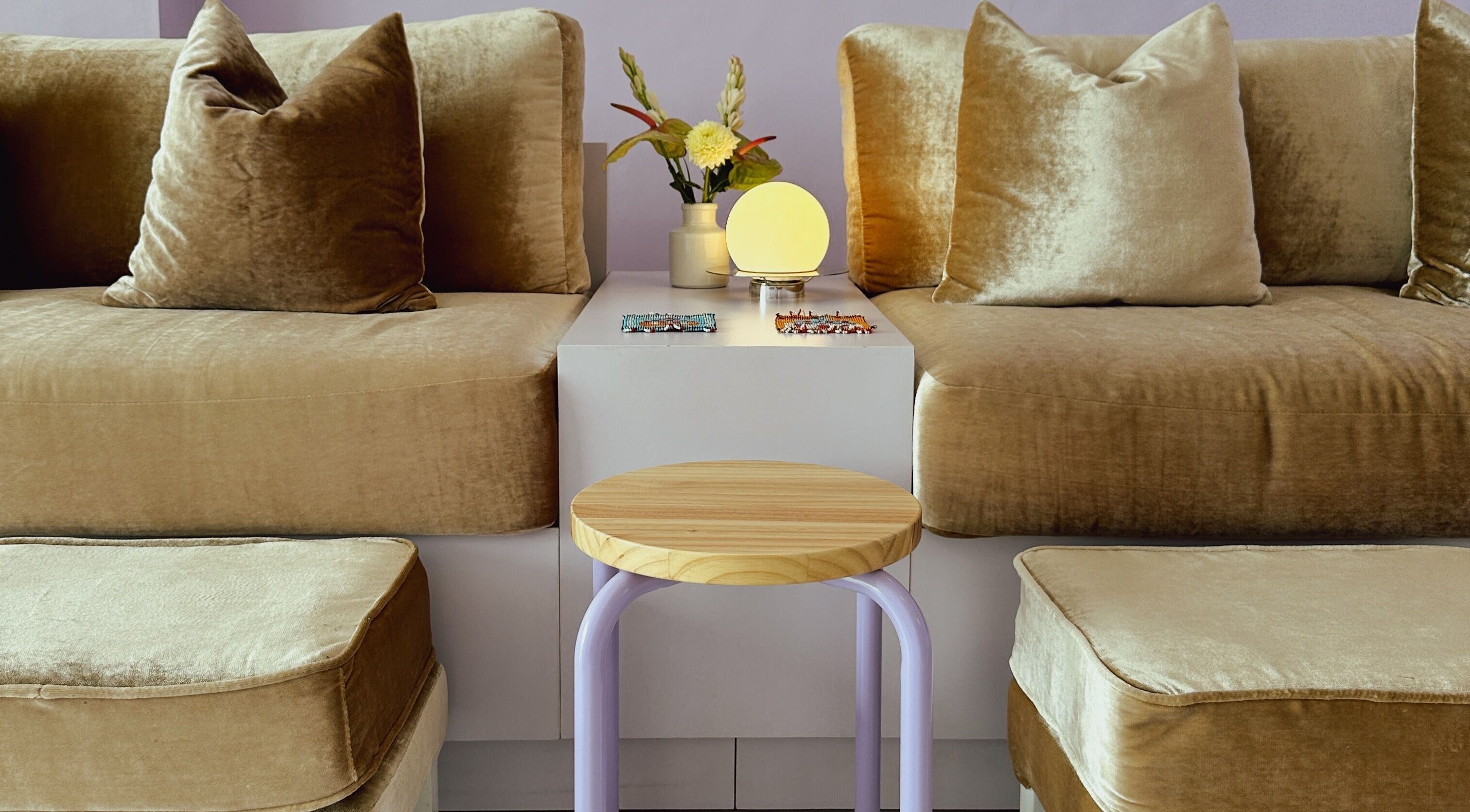 Luxurious seating area at NAILSUNSHINE, Bali, Bali, ID with plush cushions and ambient lighting.