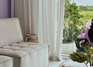 Relaxing lounge area with greenery at NAILSUNSHINE, Bali, Bali, ID, offering serene beauty and wellness services.