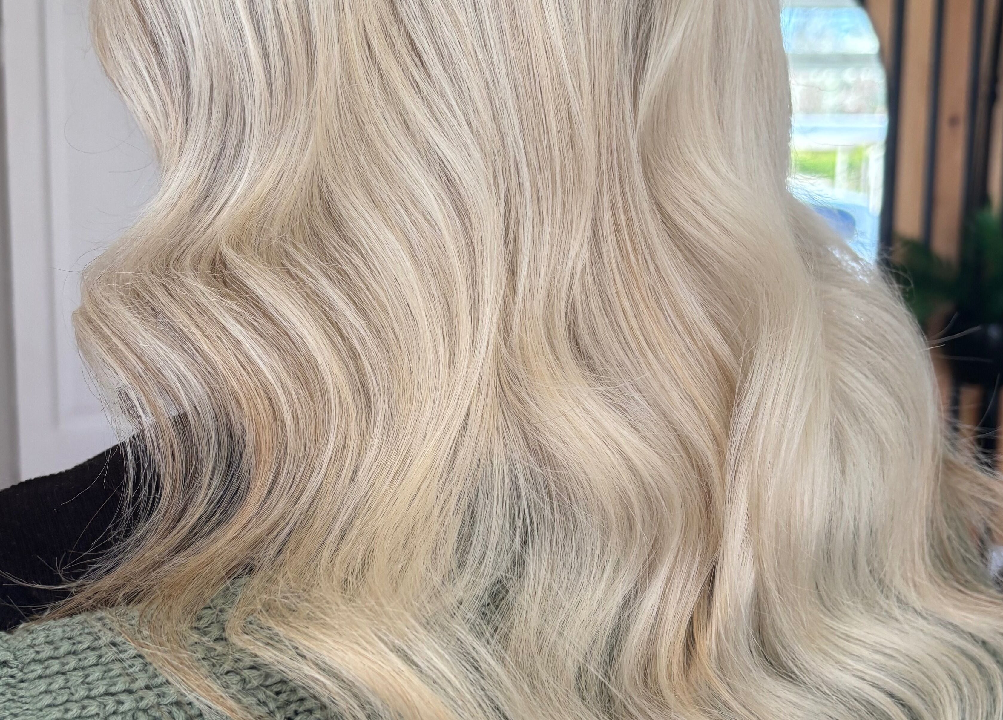Stunning blonde waves styled at Sweetie Hairdressing in Blythe Bridge, England, GB.
