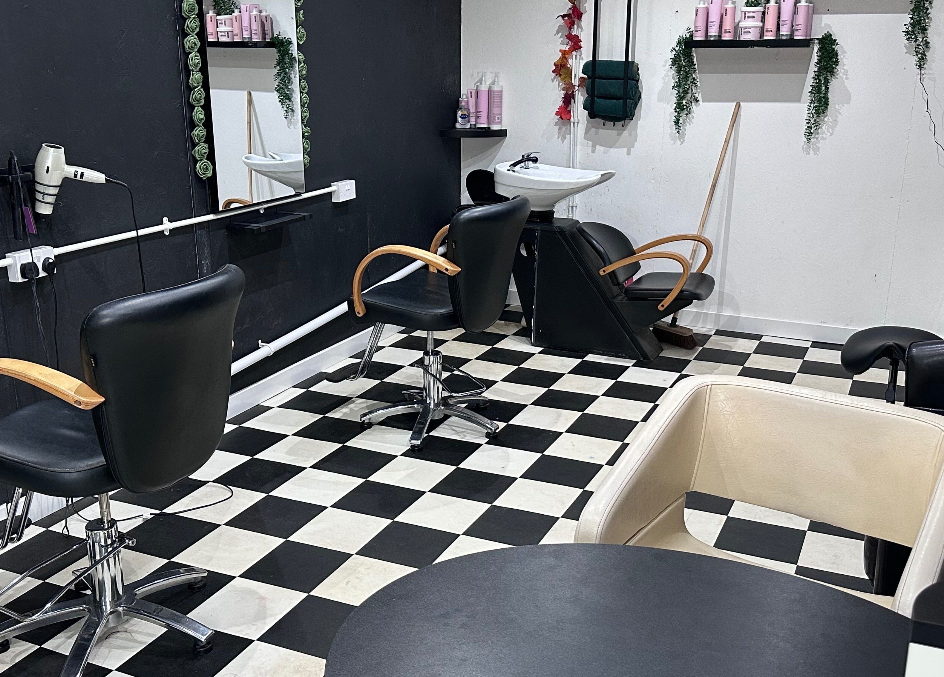 Modern styling chairs at Locks on the Levels, Middlezoy, England, GB. Elegant black and white decor.
