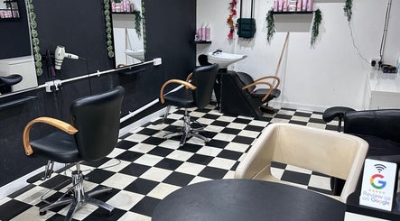 Modern styling chairs at Locks on the Levels, Middlezoy, England, GB. Elegant black and white decor.