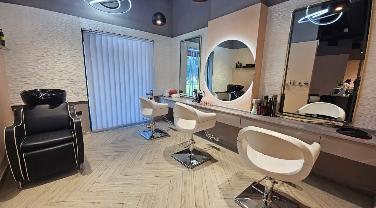 Elegant salon setting at Le Merveilleux 99 Salon, Dubai, Dubai, AE, highlighting modern styling chairs and mirrors.