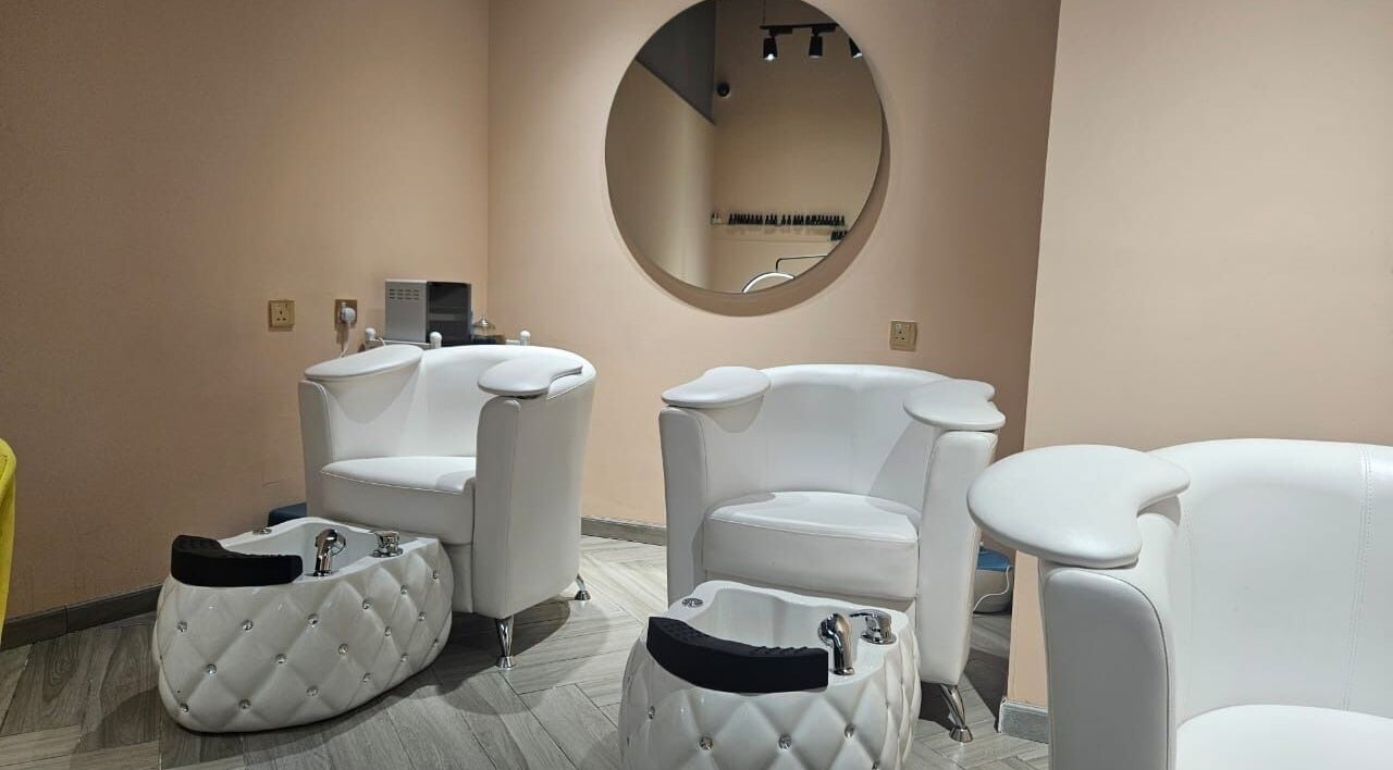 Luxurious pedicure chairs at Le Merveilleux 99 Salon, Dubai, Dubai, AE, showcasing a tranquil ambiance.