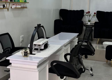 Modern nail care stations at Luxury Skincare & Spa in Pretoria, Gauteng, ZA, inviting relaxation and elegance.
