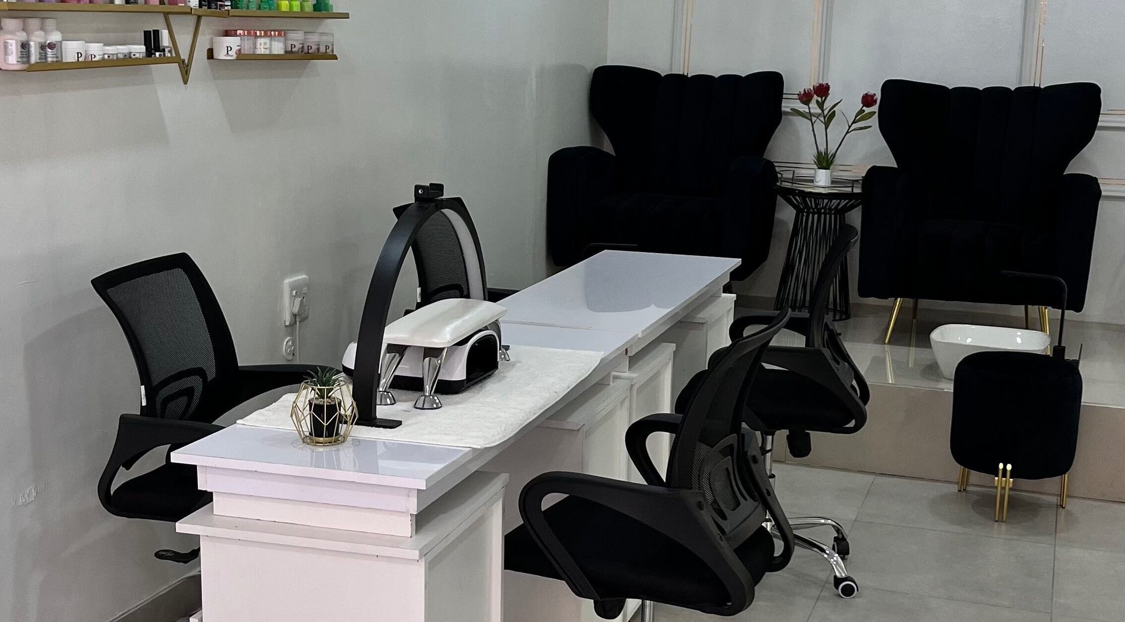 Modern nail care stations at Luxury Skincare & Spa in Pretoria, Gauteng, ZA, inviting relaxation and elegance.