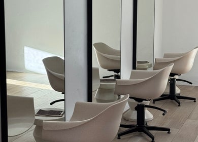 Stylish hair salon chairs and mirrors at Sundae Hair in Caloundra, Queensland, AU.