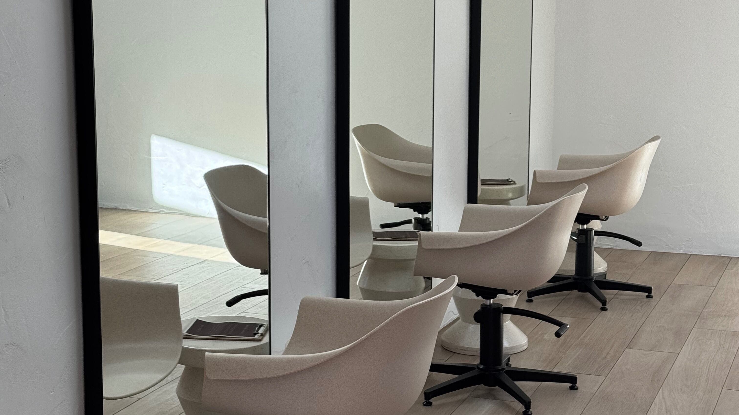 Stylish hair salon chairs and mirrors at Sundae Hair in Caloundra, Queensland, AU.