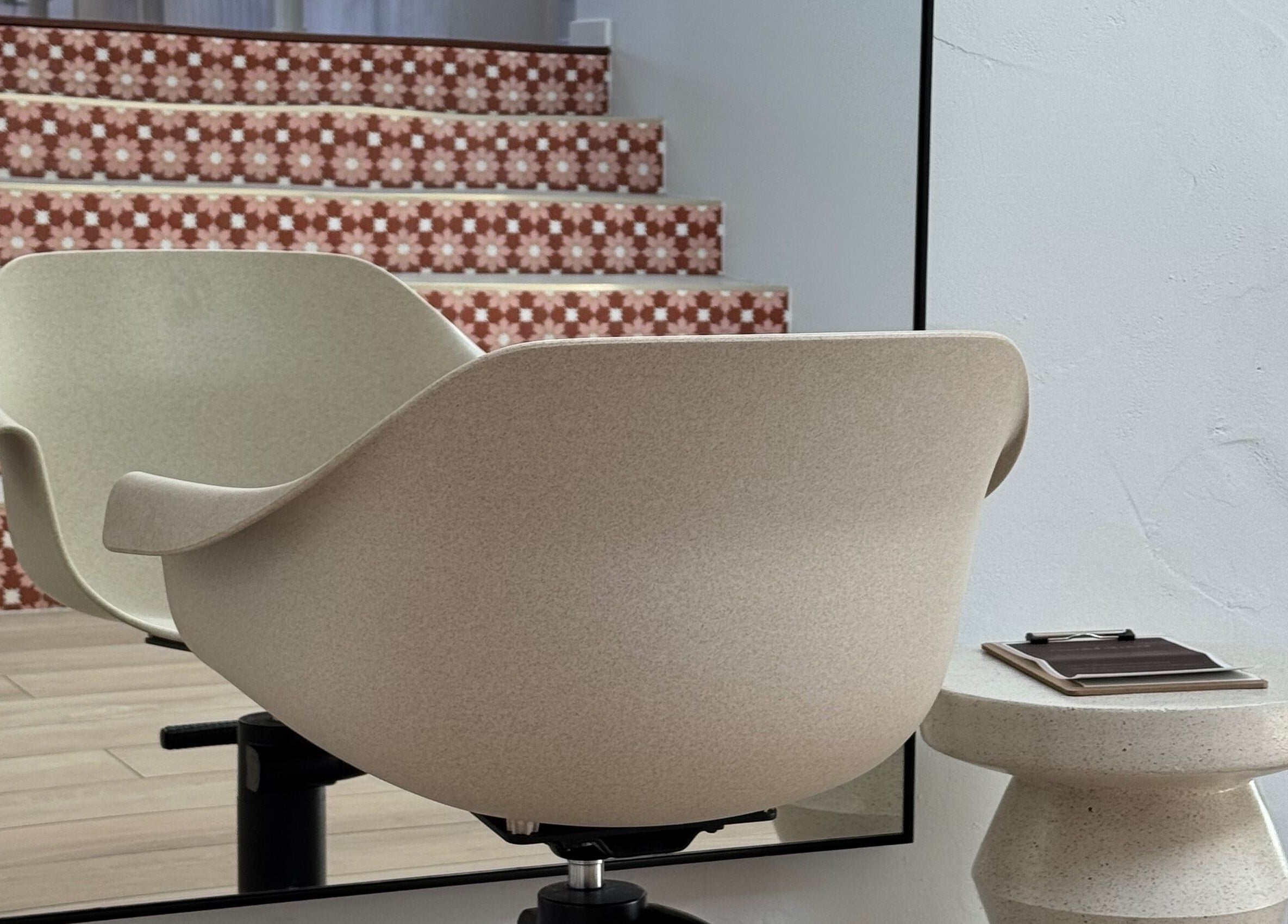 Chic salon chair and mirror at Sundae Hair, Caloundra, Queensland, AU, showcasing modern elegance.