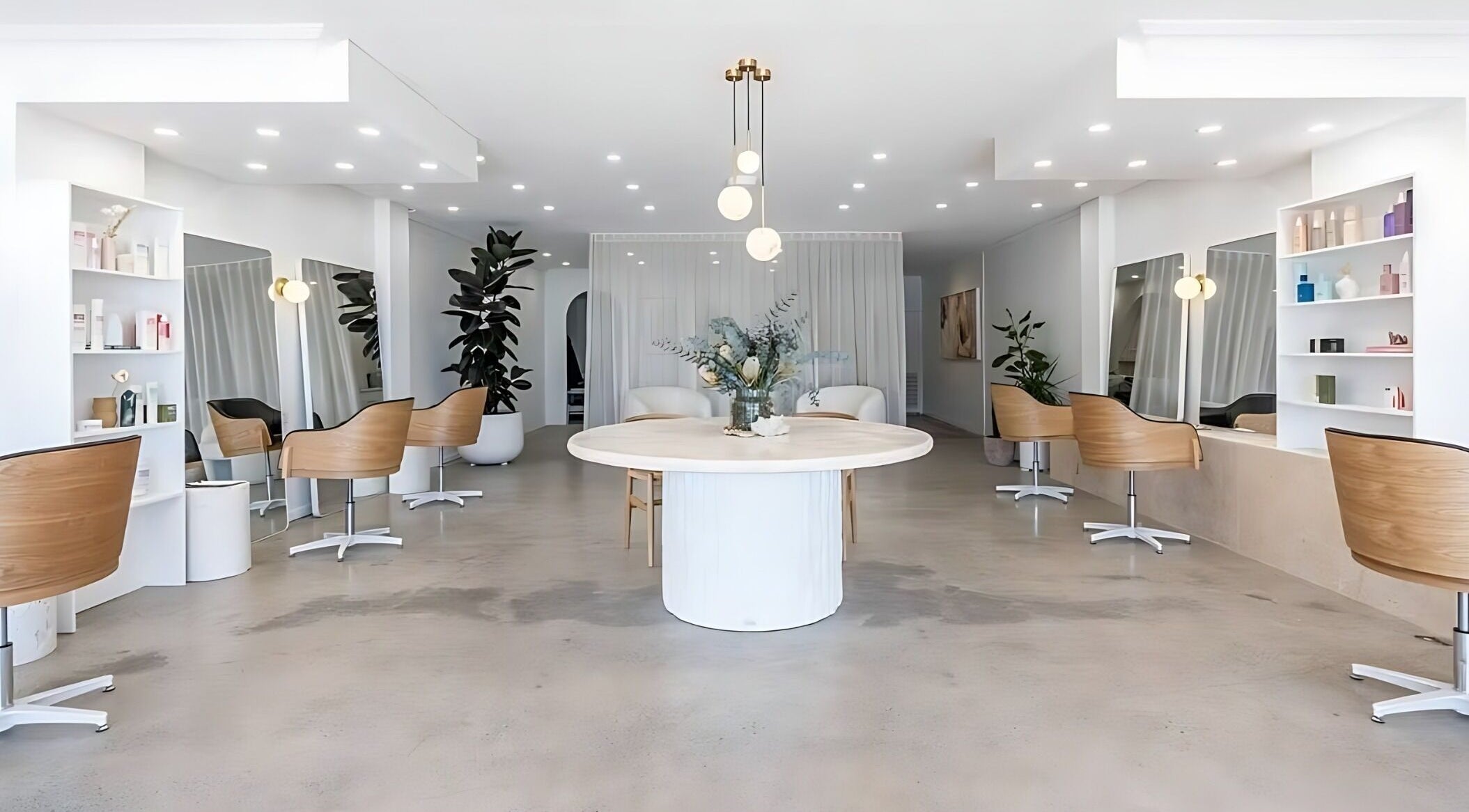 Modern styling chairs at Edward Brown Collective in Alexandra Headland, Queensland, AU with elegant decor.