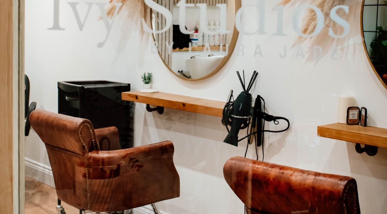 Luxurious hair salon chair and mirror setup at Ivy Studios in Ripley, England, GB, highlighting the elegant decor.
