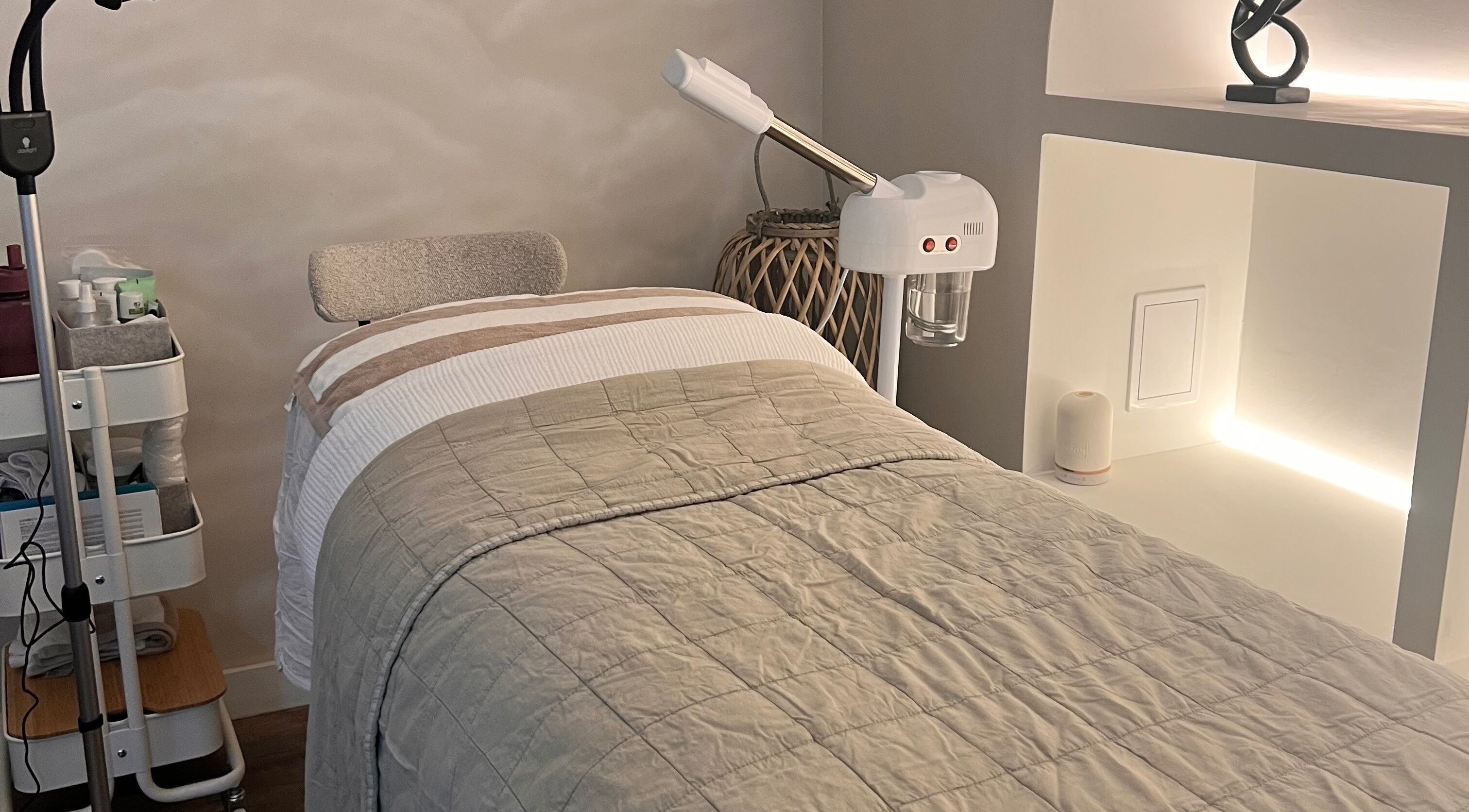 Tranquil skincare room at Club Skin | Skincare by Rachel, Liverpool, England, GB. Cozy bed and soothing decor.